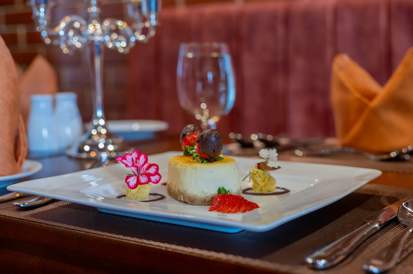 A caramelised cheesecake with chocolate-dipped strawberries at the Horton Heights restaurant