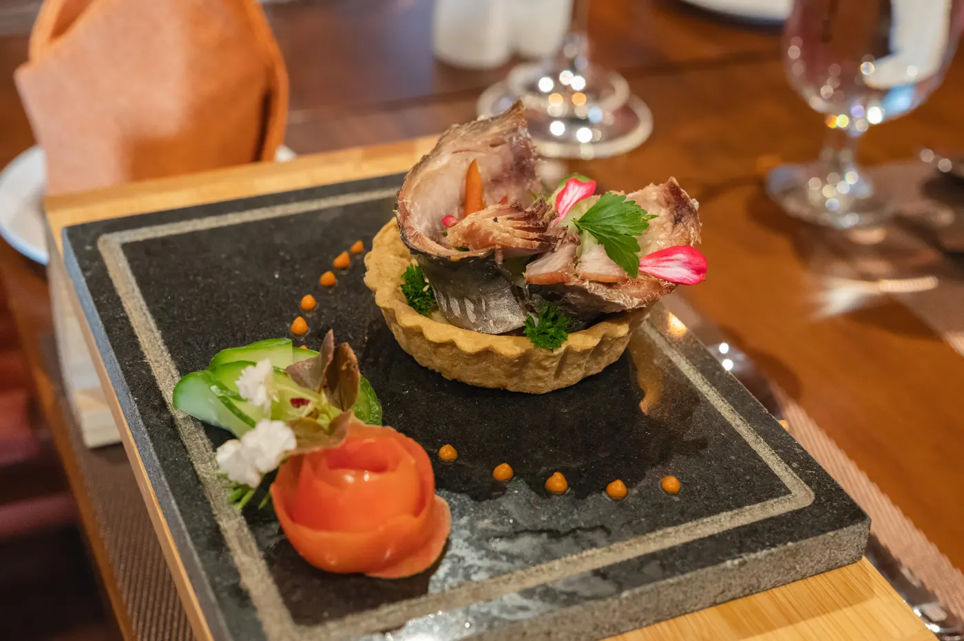 A smoked fish tartlet served on warm stone at the Horton Heights restaurant