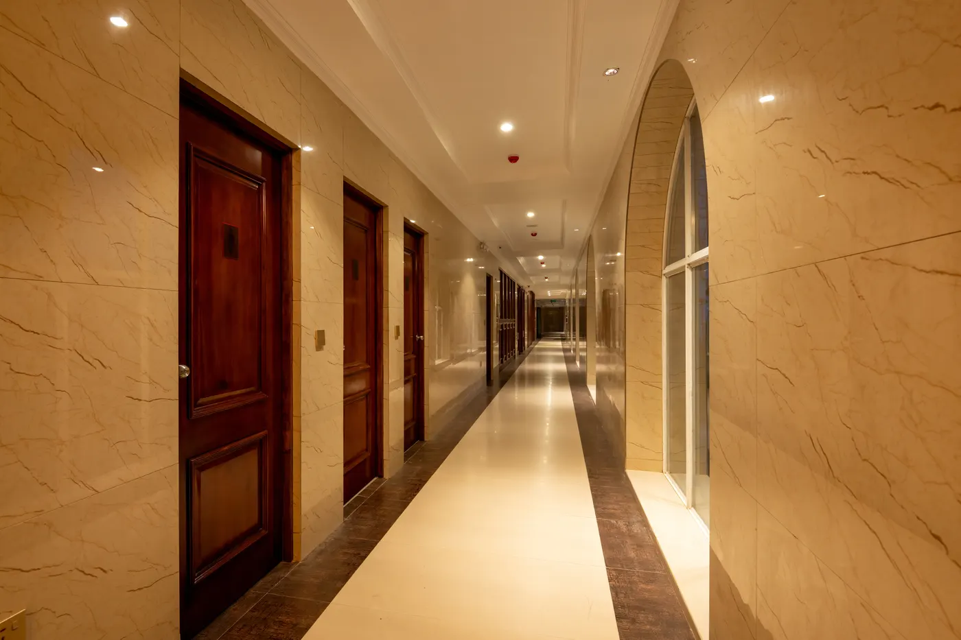 Marble-lined corridor leading to the guest rooms